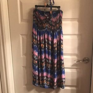 Summer dress.  Tie around neck with beads. Pattern blue, pink, white and orange